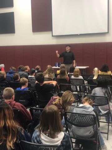 Author speaking to students