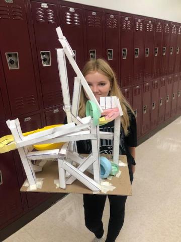 Student with water slide model